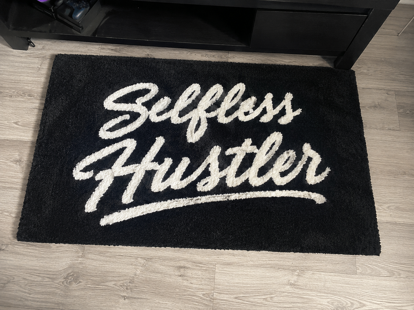 Selfless Hustler Signature Rug – Blackout Edition